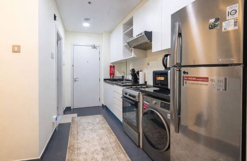 Dubai Apartment | Warm & Stylish Studio with Balcony