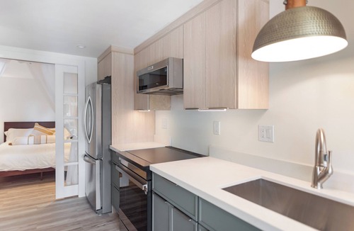 North Queen Anne House | Water and Mountain Views, 2 Kitchens, 2 Decks, Sunny Hilltop Retreat, Sleeps 11