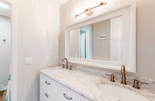 Perdido Key Coves One House | Water-view home with balcony & boat dock & tennis court access