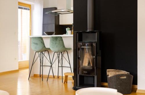 Gozd Martuljek Apartment | Waterfall Apartment - Cozy Mountain Retreat