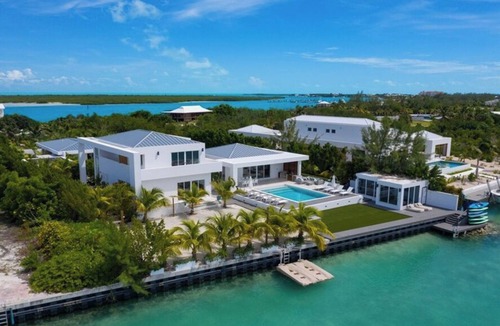 Leeward Settlement House | Waterfront Luxury Villa with Optional Boat and Beach Access Just Steps Away