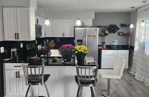 Harrison Township Condo | waterfront 2-bedroom condo with private deck overlooking Clinton River