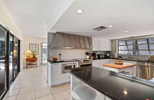 Marco Island House | Waterfront 3BR retreat with heated pool, WiFi, and marina access.