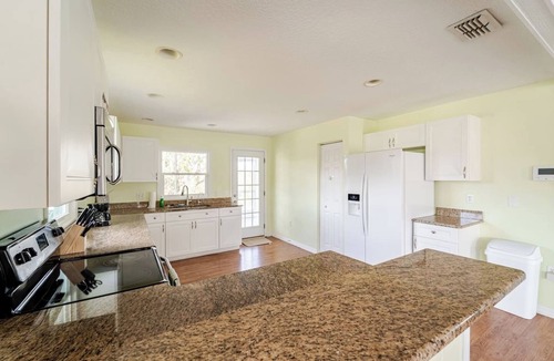 Braden River House | Waterfront 4BR w/Game Room Near UTC & IMG Sleeps 12