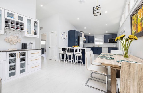 Pirates Cove House | Waterfront bayside oasis w/dock, pool, outdoor kitchen, pizza oven & fun