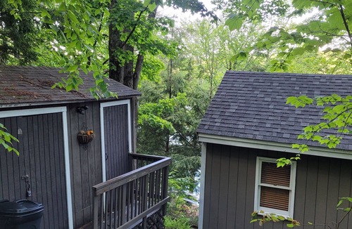 Grantham Cabin | Waterfront Cabin- look down on water from deck, private docks & fire pit