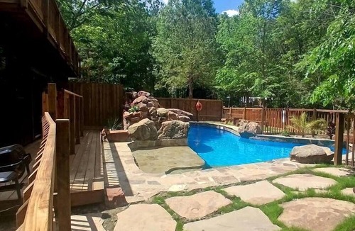 Plantersville Cabin | Waterfront Cabin Retreat with Private Dock and Pool in Plantersville Texas