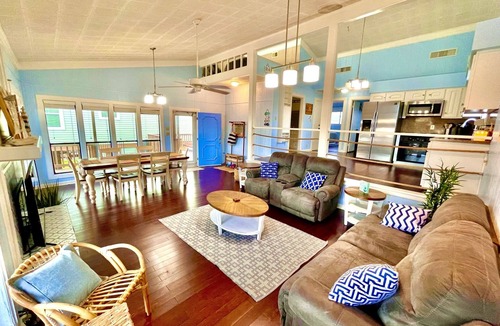 San Luis House | Waterfront Canal Bay & Beach Home with Fishing, Boat Dock, Tiki Bar & More!