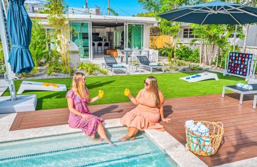Coral Ridge Villa | Waterfront Compound 2 Heated Pools SaltAire Lime Keys