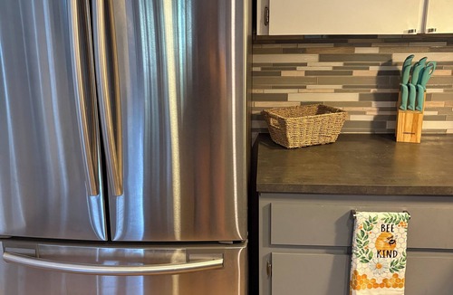 Inverness Condo | Waterfront condo, community pool overlooking the canal leading to Henderson Lake