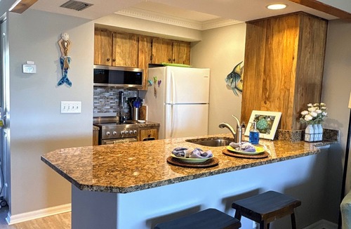 Captains Cove Condo | Waterfront Condo w/Boat Dock, Kayak, Bikes, Pool & Pickleball-Best Fishing!