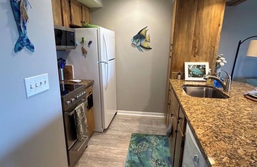 Captains Cove Condo | Waterfront Condo w/Boat Dock, Kayak, Bikes, Pool & Pickleball-Best Fishing!