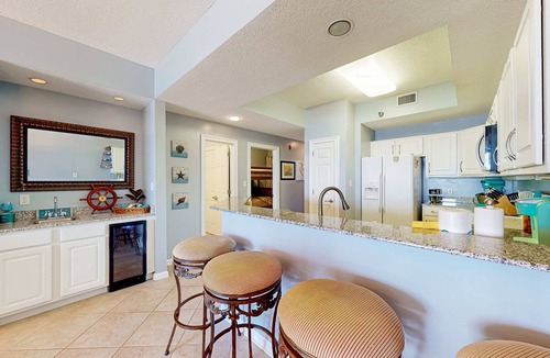 Orange Beach Condo | Waterfront condo with shared pool, tennis, & sauna - near the beach