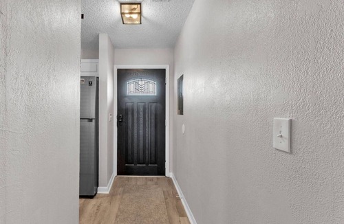 Winter Haven Condo | Waterfront Condo w/Pool access, Dock, Patio Views & 3 Miles from LEGOLAND