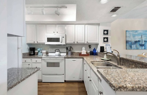 Shelter Cove Condo | Waterfront condo with walkable locale, central AC, washer/dryer, & shared pool