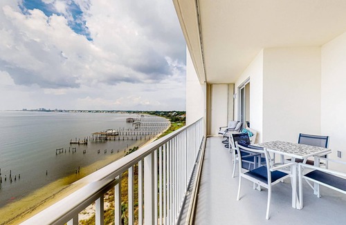 Ono Island Condo | Waterfront condo with beach access, pools, balcony, central AC, & W&D
