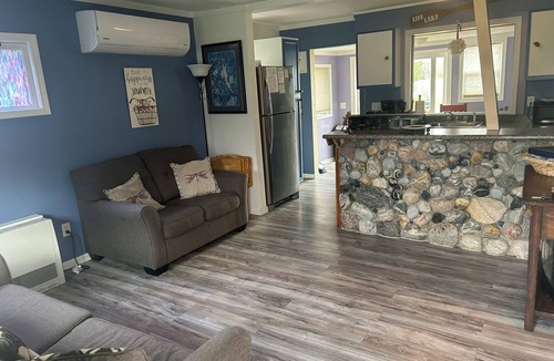 Elk Rapids House | Waterfront cottage in Elk Rapids on Bass Lake. Firepit, dog ok