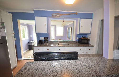 Elk Rapids House | Waterfront cottage in Elk Rapids on Bass Lake. Firepit, dog ok
