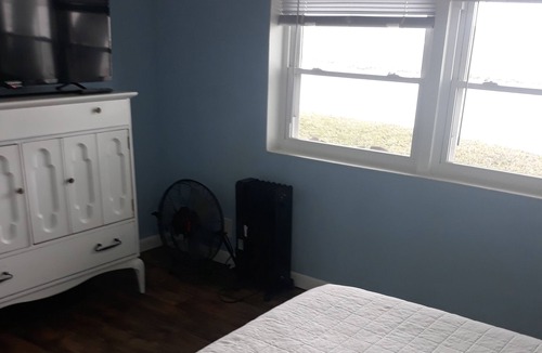 Valona Cottage | Waterfront Cottage Sleeps 11, Big Dock, a RV Hookup, on 18 Gated Acres