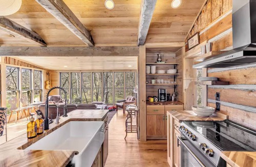 Nunnelly Cabin | Waterfront Designer Cabin w/Dock, Decks, Hot tub and Fire Pits.