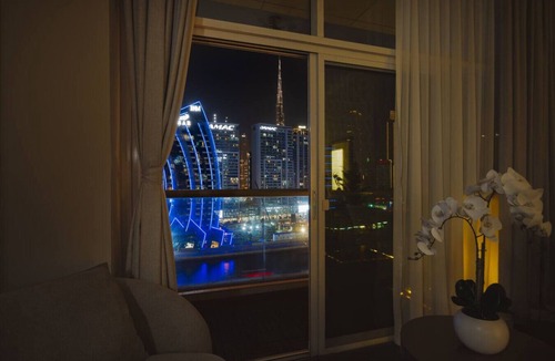 Business Bay Apartment | Waterfront Escape | Burj & Canal View | Pool+Sauna