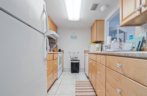 Dunedin Condo | Waterfront Escape! Heated Pool, BBQ, Clubhouse & Pier – Dolphins & Sunsets from Your Private Porch!