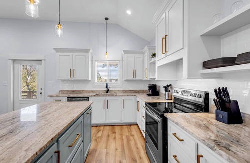 Shoreline Park House | Waterfront Escape in Bay STL with dock,pickleball, ping pong, basketball & more!