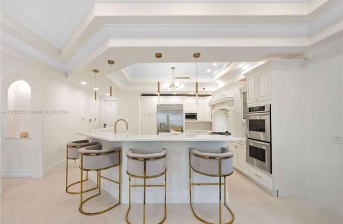 Eastern Shores House | Waterfront gated pool mansion.