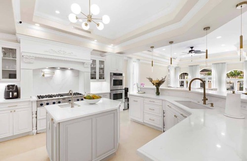 Eastern Shores House | Waterfront gated pool mansion.