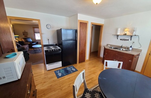 Algoma House | Waterfront Getaway with reserved Dock/Boat Slip on Ahnapee River Wifi