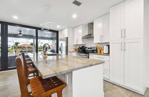 Apollo Beach House | Waterfront, heated Pool, kayaks, Game room, fishing