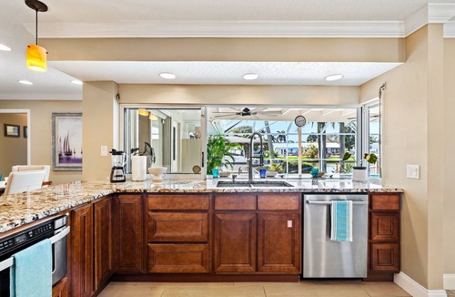 Venetian Way House | Waterfront Heated Pool w/Boat Dock & Cosmic Mini Gof - 4bd 2ba Paradise Found