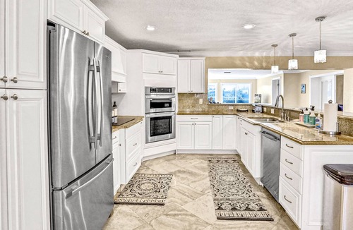 Island Estate House | Waterfront home with private pool, spa, dock/water access, patio, & home office