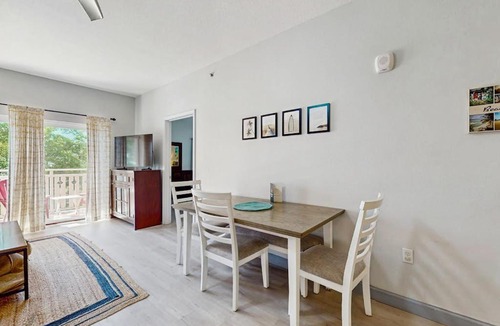 Waterside Village House | Waterfront Home Close to Beach with Shared Pool Hot Tub Free WiFi & Central AC