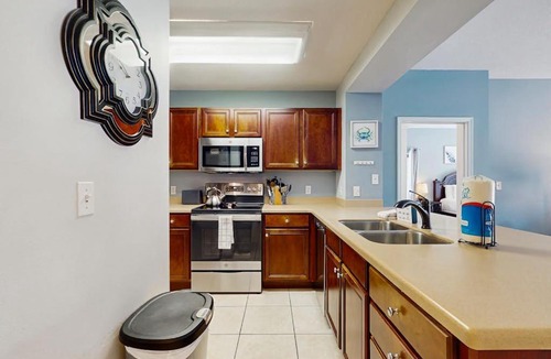 Waterside Village House | Waterfront Home Close to Beach with Shared Pool Hot Tub Free WiFi & Central AC