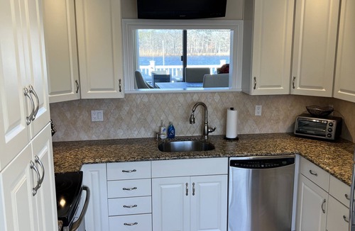 Oakdale House | Waterfront home, deck, bbq, fire pit, boats, hot tub, and more!