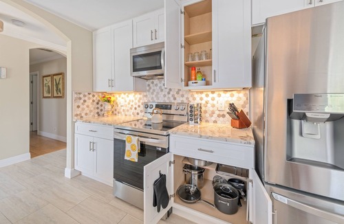 Convair Cove House | Waterfront Home with Pool | Walk to Beach | Family & Dog Friendly | Launch Views