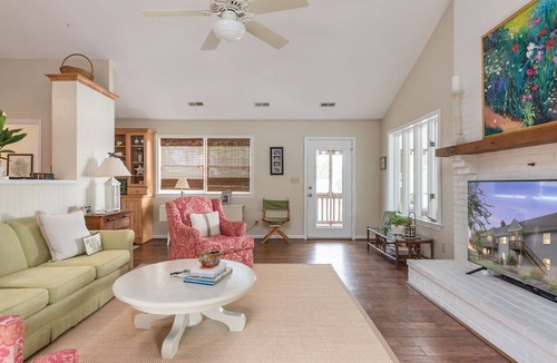 Dogue House | Waterfront home with swimming pool and tennis court.