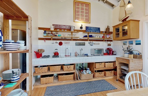 Salmon Creek Cottage | Waterfront home with views of the mountains and Salmon Creek - dogs welcome