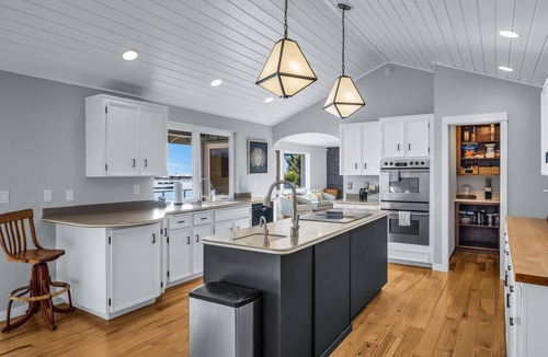 Gig Harbor House | Waterfront home with private hot tub, game room with game tables, and water toys