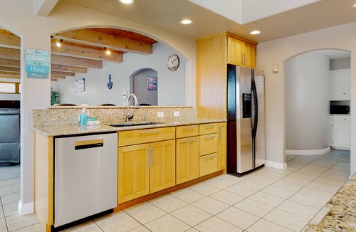 Oak Harbor House | Waterfront home with private dock, kayaks, sauna, firepit, fireplace, tennis
