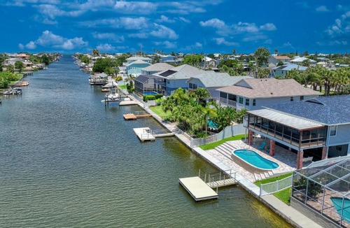 Spring Hill House | Waterfront HomeHeated PoolArcade Games