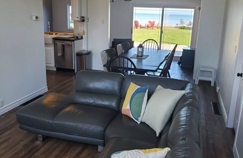 Pointe aux Roches House | Waterfront House next to Golf Course.