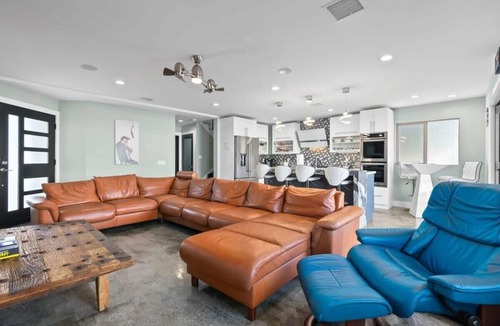 Sunset Beach House | Waterfront Luxury w/Hot Tub & Free Duffy Boat