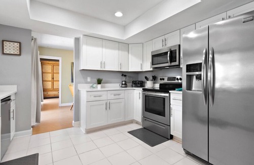 BallenIsles House | Waterfront Magnolia: Heated Pool, Tiki, Gameroom