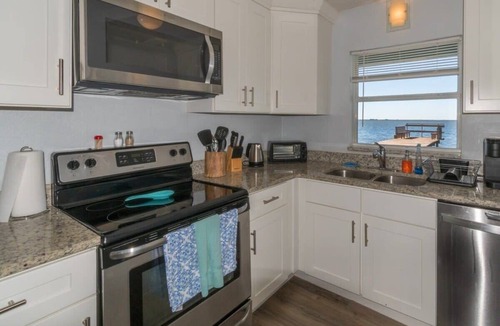 Orlando Beach Apartment | Waterfront Oasis! Private Pier, Walk to Beach