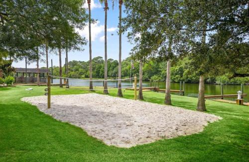 Dickinson House | Waterfront oasis with private pool, game room, fire pit and volleyball court