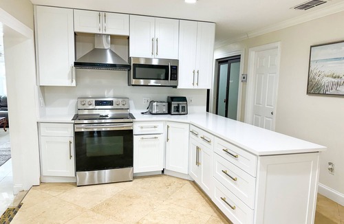 West Palm Beach House | WATERFRONT PALM BEACH 5BR/4BA HOME - PRIVATE BOAT DOCK/POOL/HOT TUB