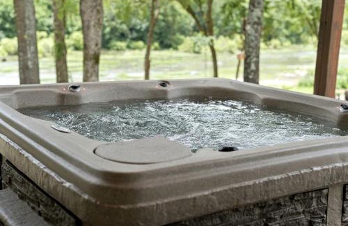 Golden House | Waterfront Pet Friendly Cabin on Glover River with Hot Tub near Broken Bow, Oklahoma