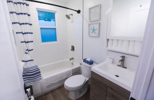 Tudor and Cashel Villa | Waterfront-Pet Friendly-HotTub-Firepit-BBQ